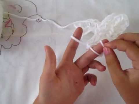 Tejer una flor con los dedos (Truecarte)