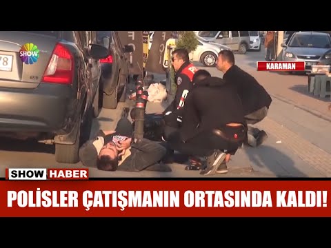 Polisler çatışmanın ortasında kaldı!