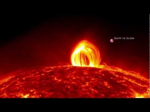 NASA SDO - Fiery Looping Rain on the Sun