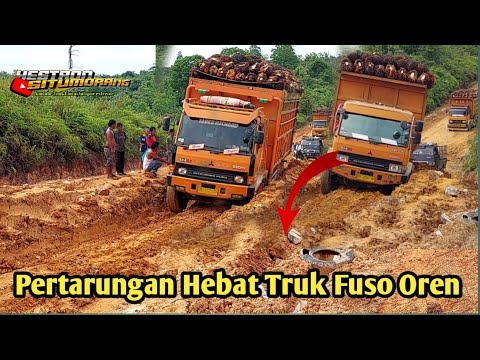 Thumbnail for Bikin Melotot!! Rombongan Truk Fuso Oren Menjajal Jalan Lumpur Yang Tebal